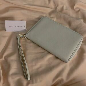 LOST +‎ WANDER Worryfree Passport Wallet NWT with detachable wristband.